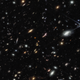 A section of the recent deep field, showing an ancient galaxy (in the box labeled 1)
